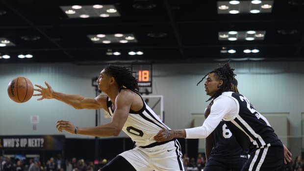 Feb 18, 2024; Indianapolis, Indiana, USA; Team Giraffe Stars forward Matas Buzelis (13) of the G League Ignite shoots the ball over Team BallIsLife forward-center Skal Labissiere (8) of the Stockton Kings during the G-League Next Up game at Indiana Convention Center. Mandatory Credit: Trevor Ruszkowski-USA TODAY Sports